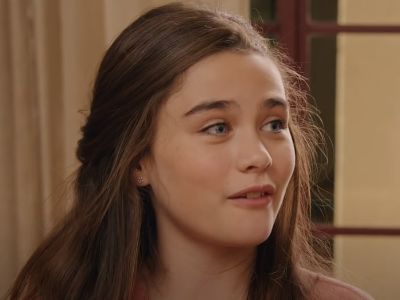 Lola Flanery is talking to someone not visible in the picture.